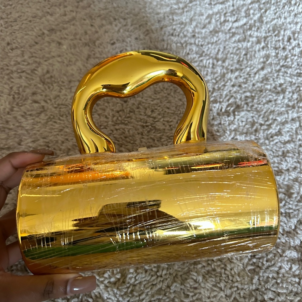 CHROME GOLD CLUTCH PURSE

**BRAND NEW**